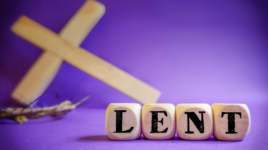 close-up-of-lent-text-with-cross-against-purple-royalty-free-image-1642283107.jpg